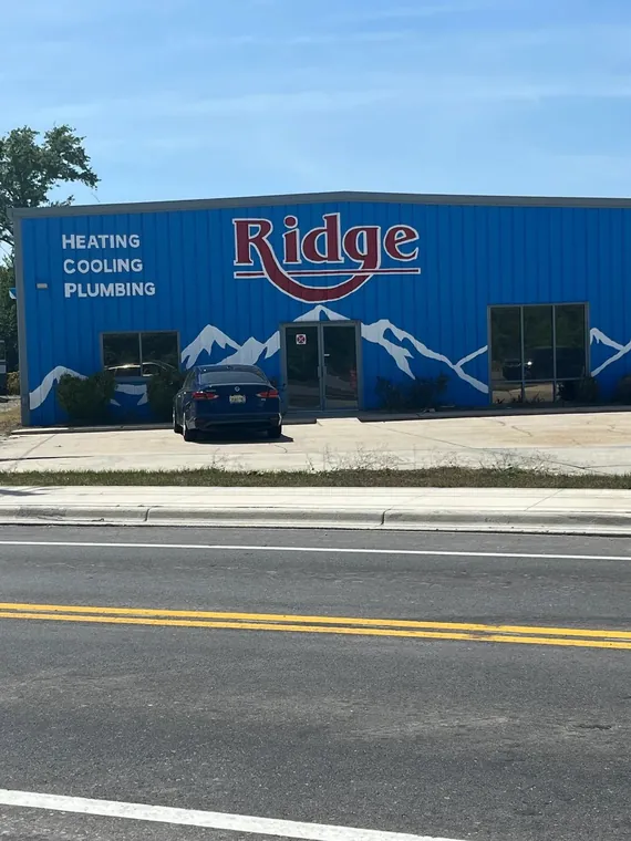 Commercial exterior repaint of a metal building for an HVAC company