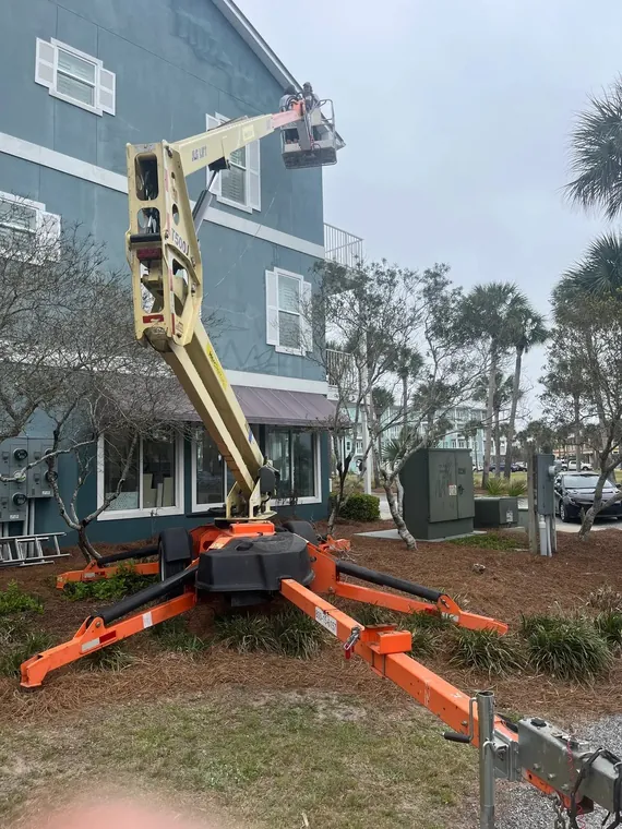 Spider-lift access for high multi-story exterior painting