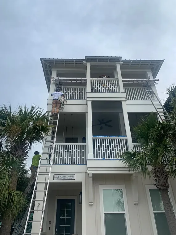 Three-story coastal home exterior painting in Seacrest Beach, FL